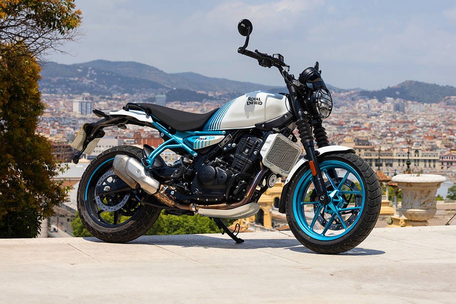 Royal Enfield Guerrilla 450 – new global launch motorcycle with modern retro design, blue alloy wheels, and 450cc engine.