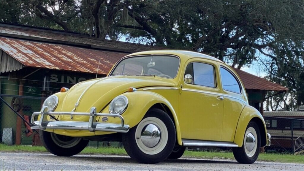 Classic Volkswagen Beetle yellow model showcasing vintage design and timeless appeal