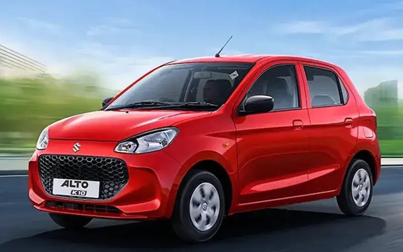 A red Maruti Suzuki Alto is shown from a front view