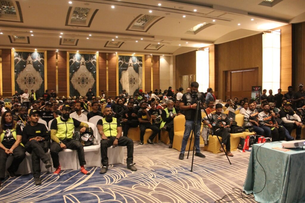 
A line of riders from the DBBR biker group on their motorcycles, fully geared up on a foggy road, preparing for a group ride near Delhi-NCR.